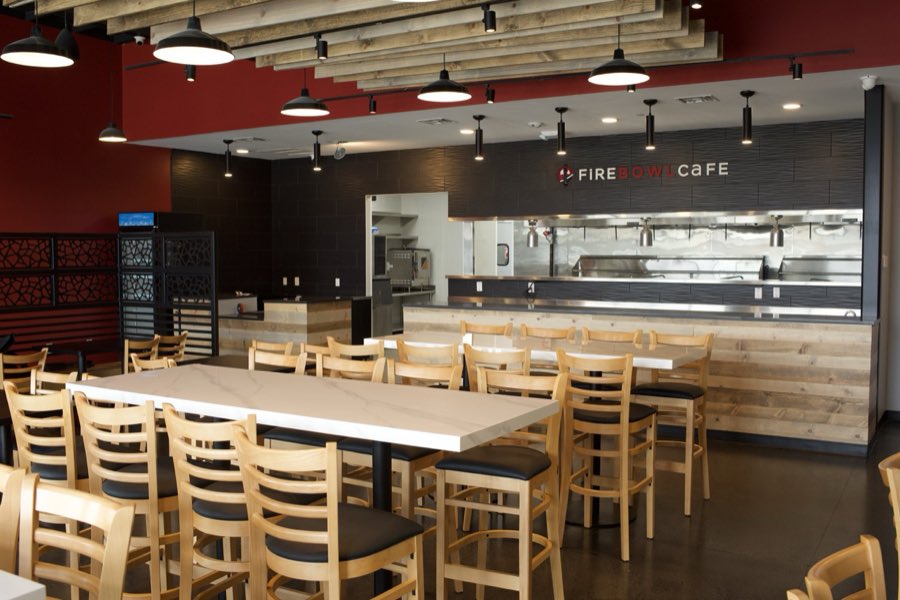 Fire Bowl Café dining room with timber tables, pendant lighting and an open service counter