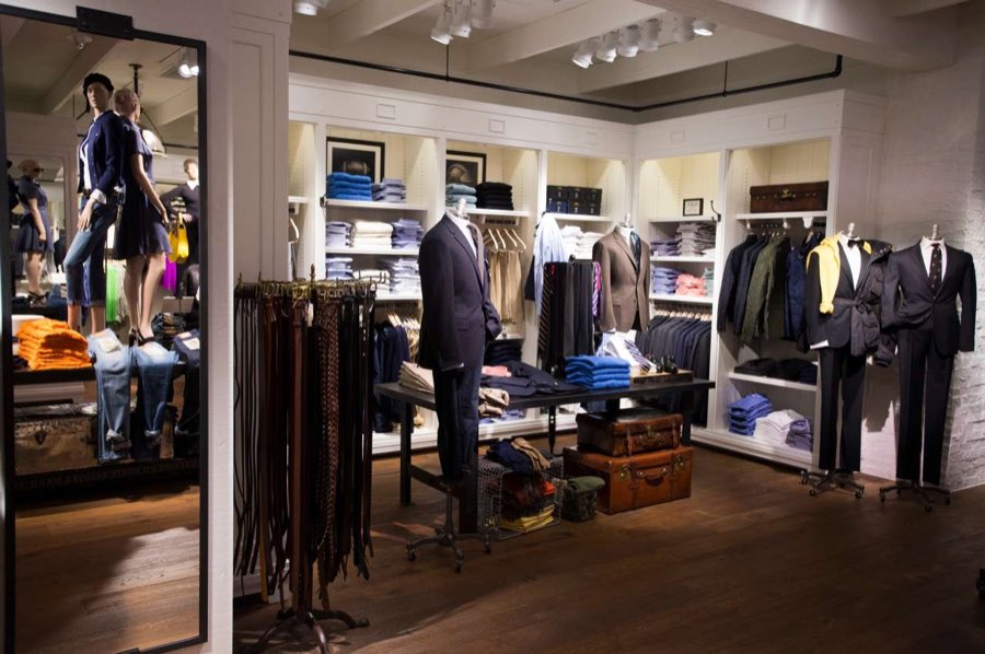Ralph Lauren store interior with tailored menswear, timber floors and white display joinery